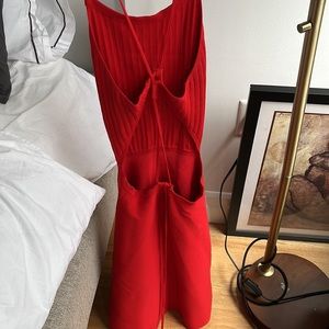 Red, backless knitted dress